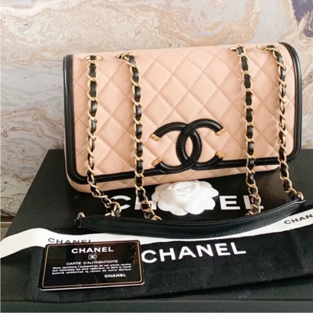 Authentic Chanel Medium Filagree Quilted Leather Bag